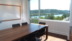conference room, wood table, large window
