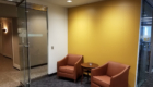 KPMG Entryway, two chairs, yellow walls
